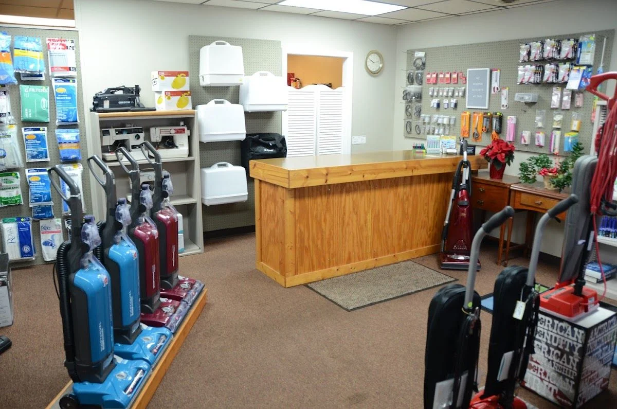 Mann's Sewing Machine and Sweeper